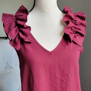 Ruffle detail sleeveless top